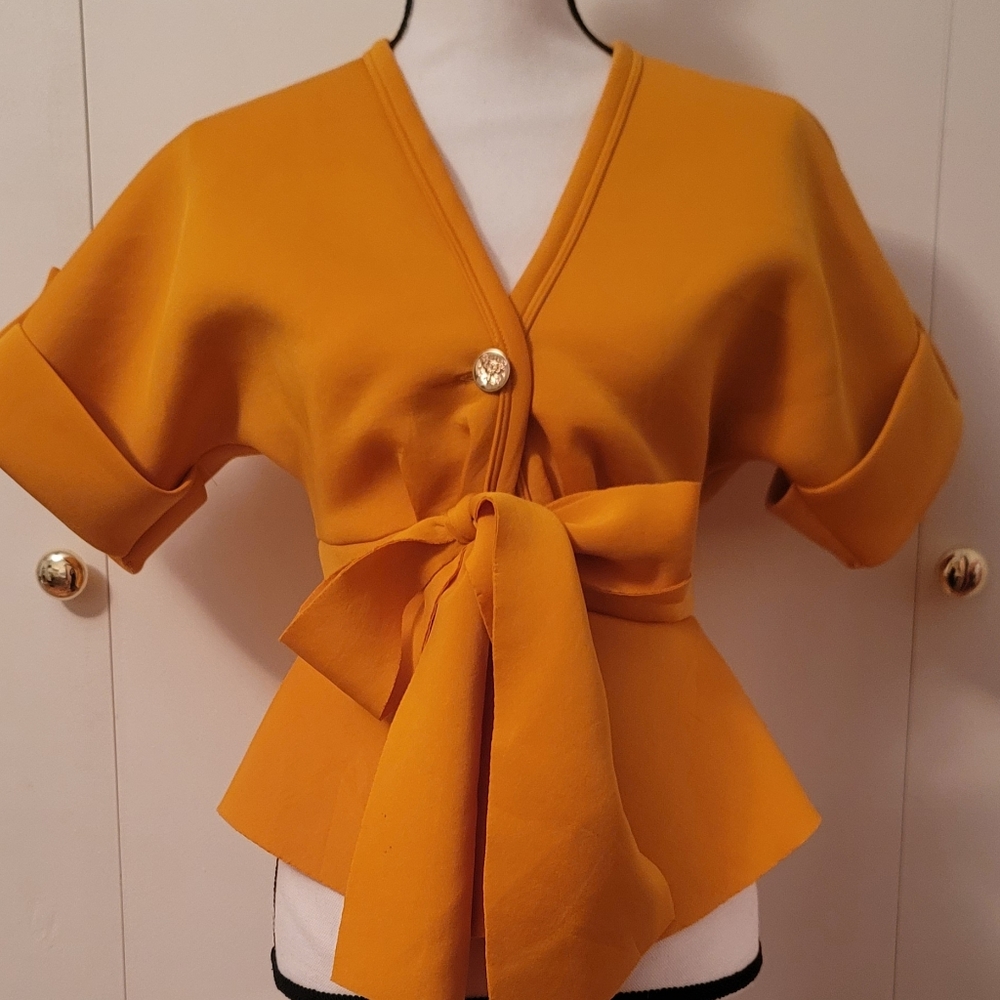 Akira beautiful yellow/orange top, You can dress up or down.